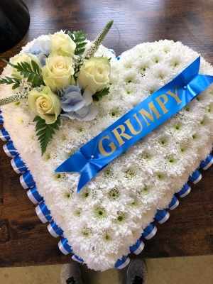 Blue and white heart tribute