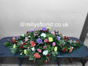 Mixed coloured carnation Casket Spray